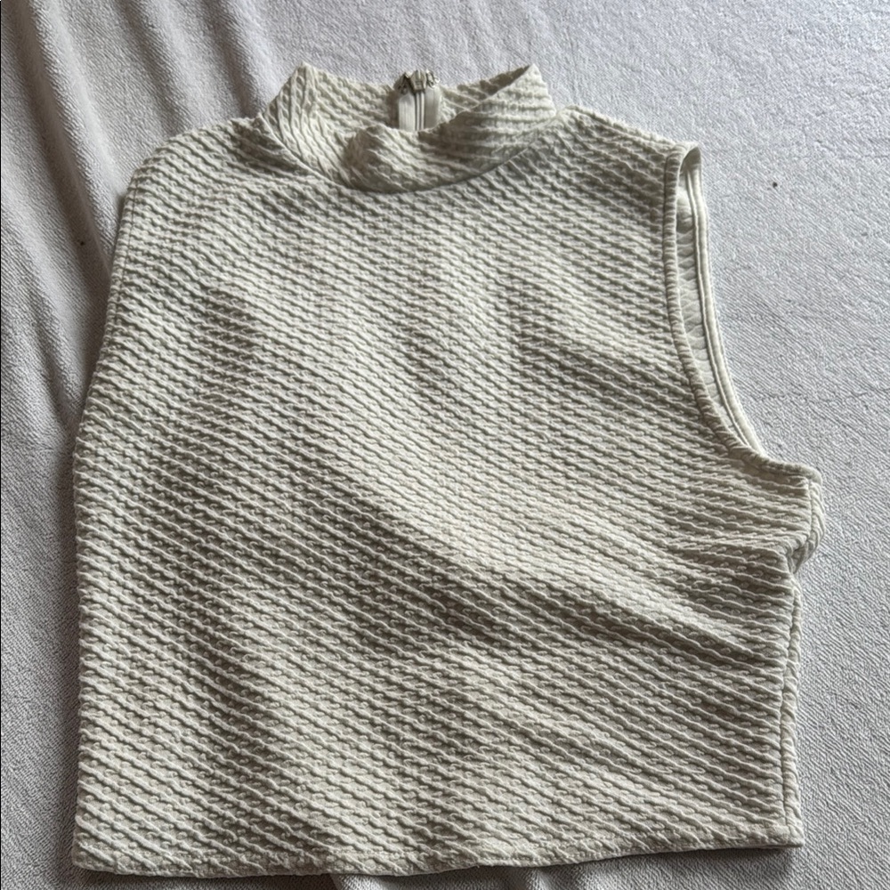 Elegant Cream Sleeveless Sweater